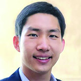 Yang Qu smiles at the camera